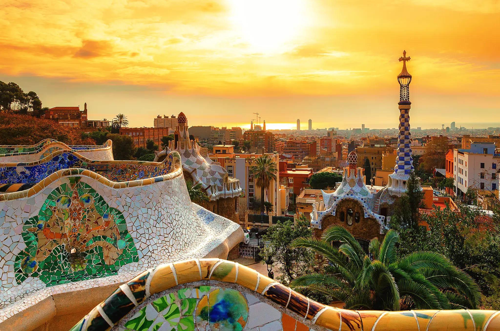The sun sets over Barcelona, casting a warm glow across the city’s skyline and iconic architecture, symbolising global studies, diplomacy, and Spanish language learning for the History and Spanish BA (Hons) degree.