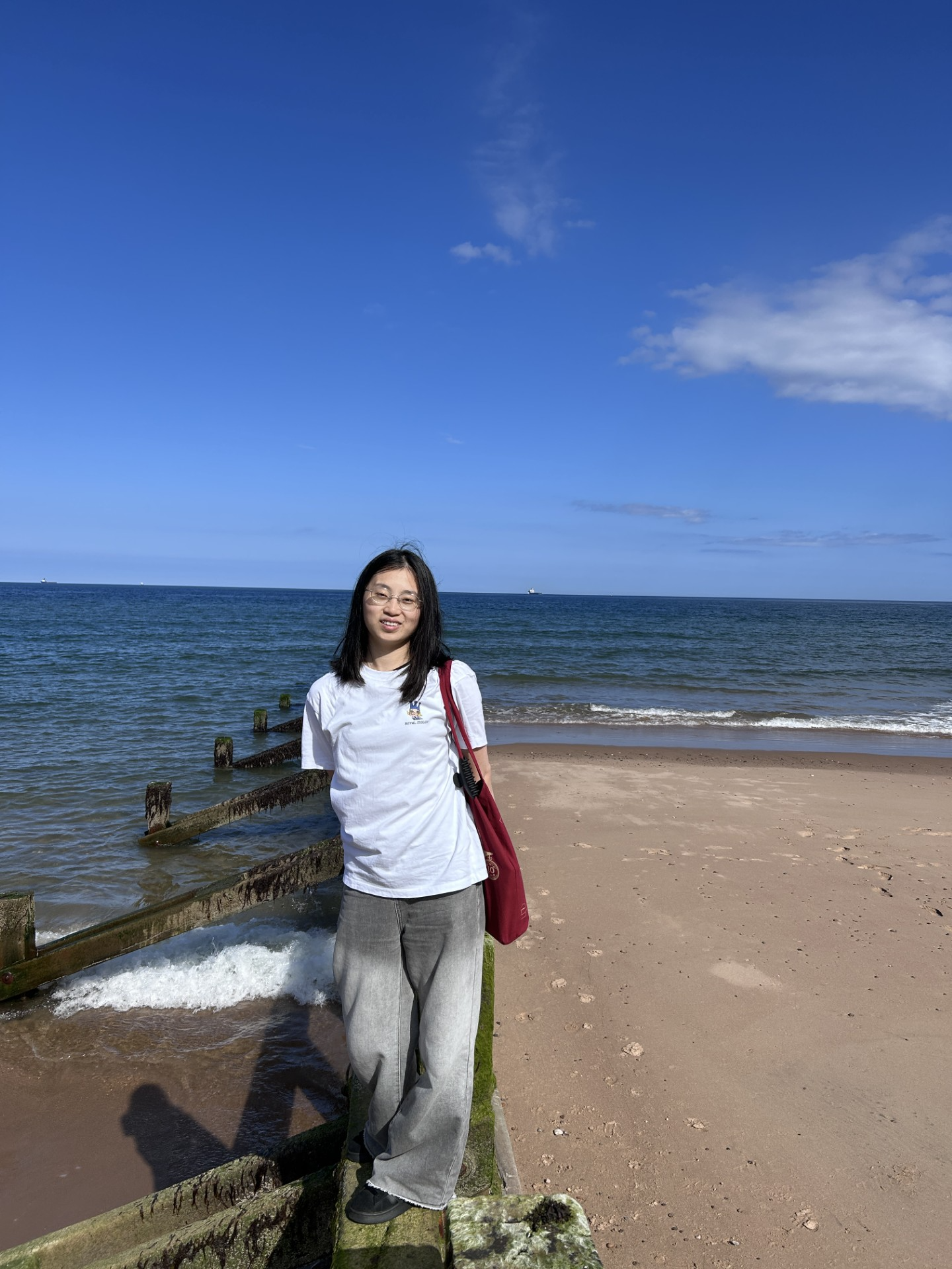 Huiyuan Huang stood on the beach