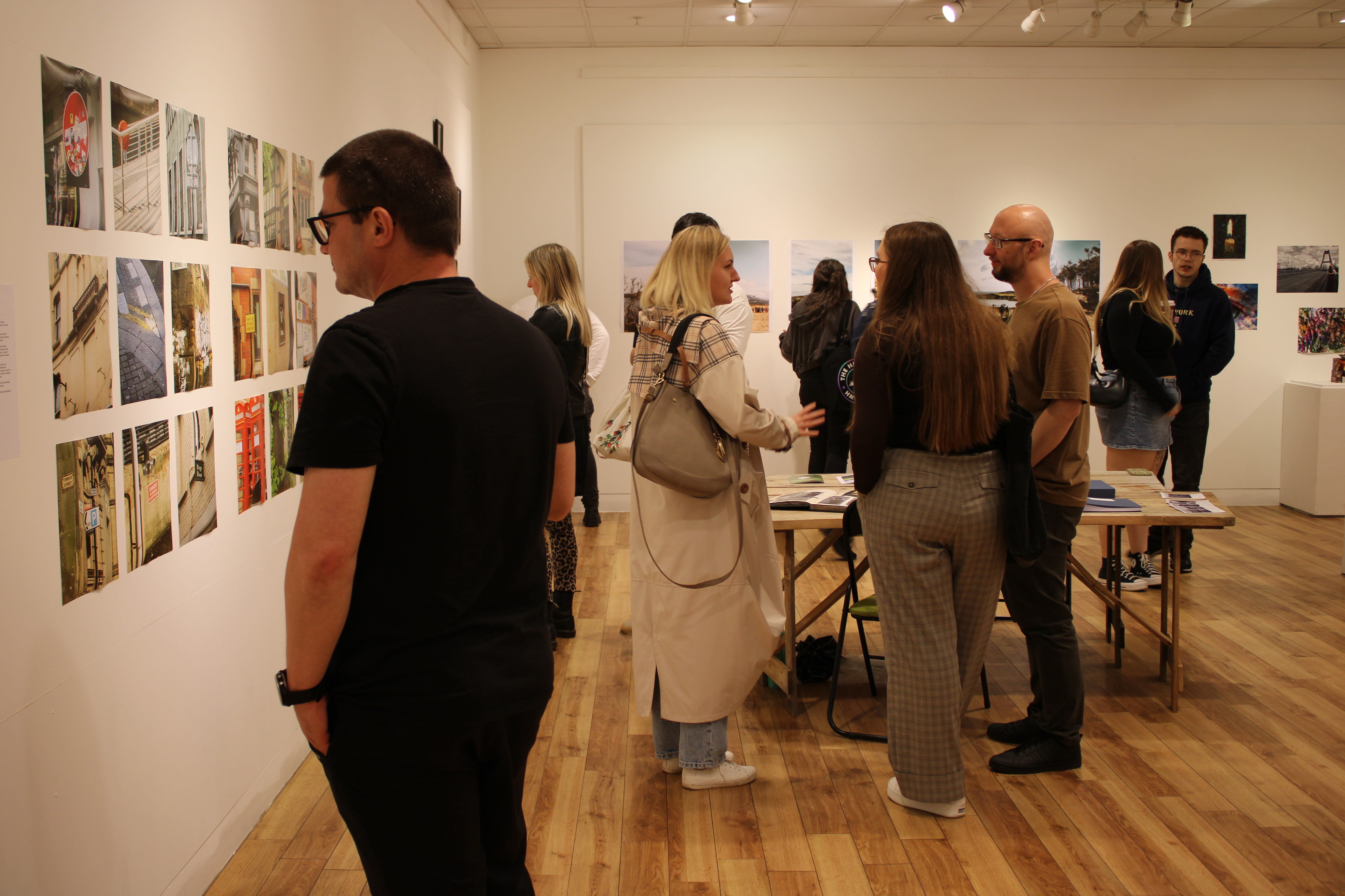 People looking at photography exhibition