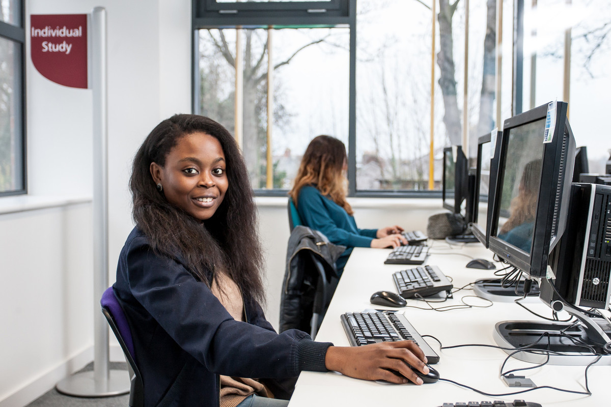 Student on a computer at Seaborne Library