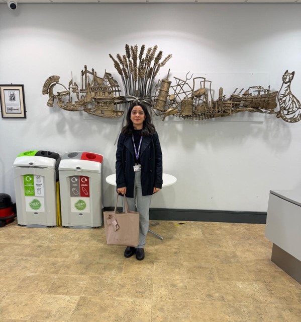 Maryam stood in a building on campus