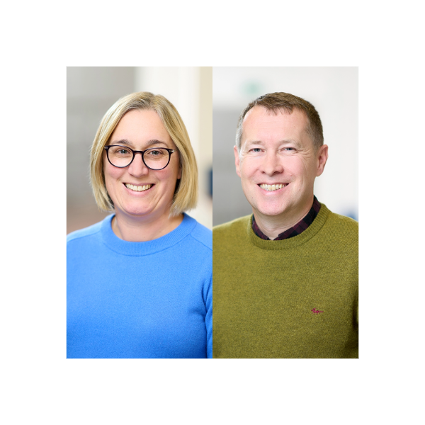 Female and Male professional smiling