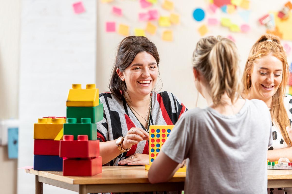 Students on the Early Years and Primary Education (with QTS) BA (Hons) degree gaining hands-on teaching experience through interactive learning activities in a classroom setting.