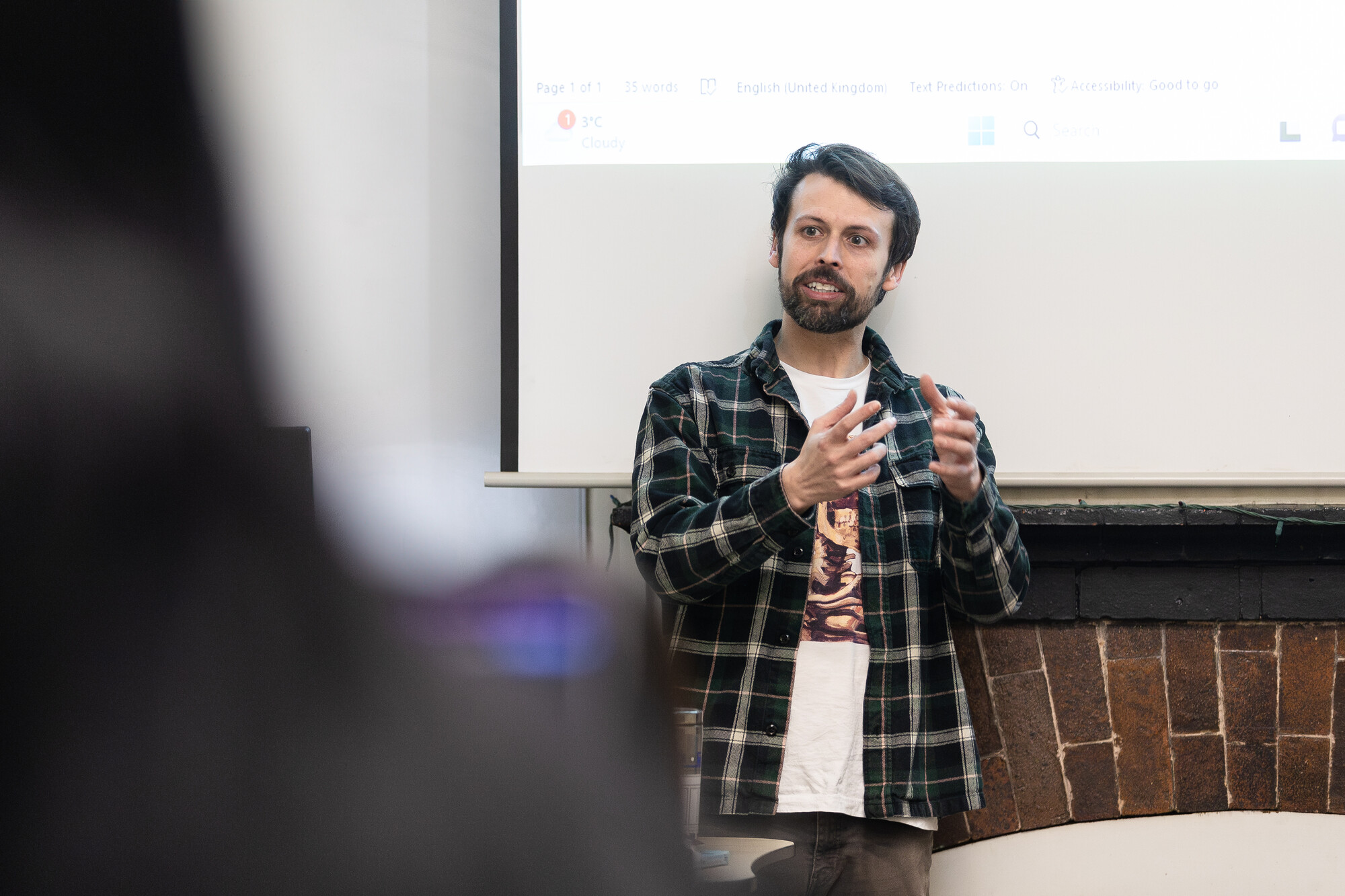Lecturer in a seminar room