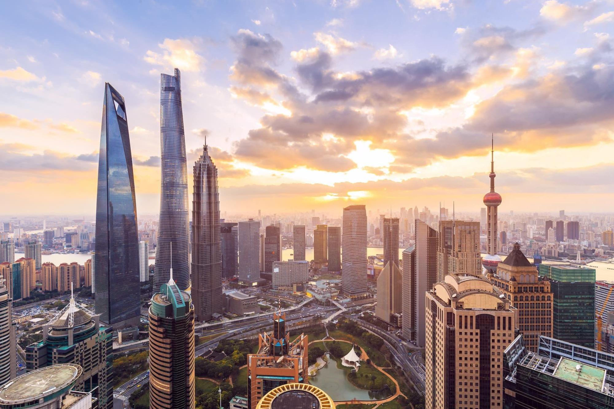 City skyline at sunset with modern skyscrapers and urban architecture, representing China’s global influence and international connections explored in the Chinese and Global Affairs: Politics and International Relations BA (Hons) degree.