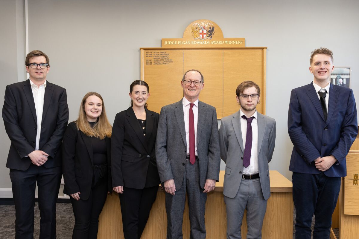 HHJ Steven Everett with mooting competition finalists.