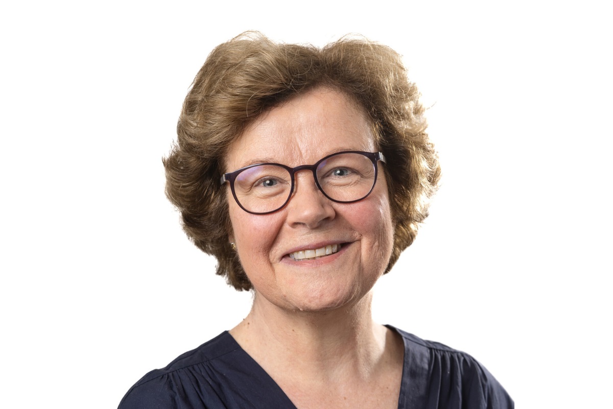 A head and shoulders photo of Vice-Chancellor Professor Eunice Simmons smiling at the camera, in front of a white background.