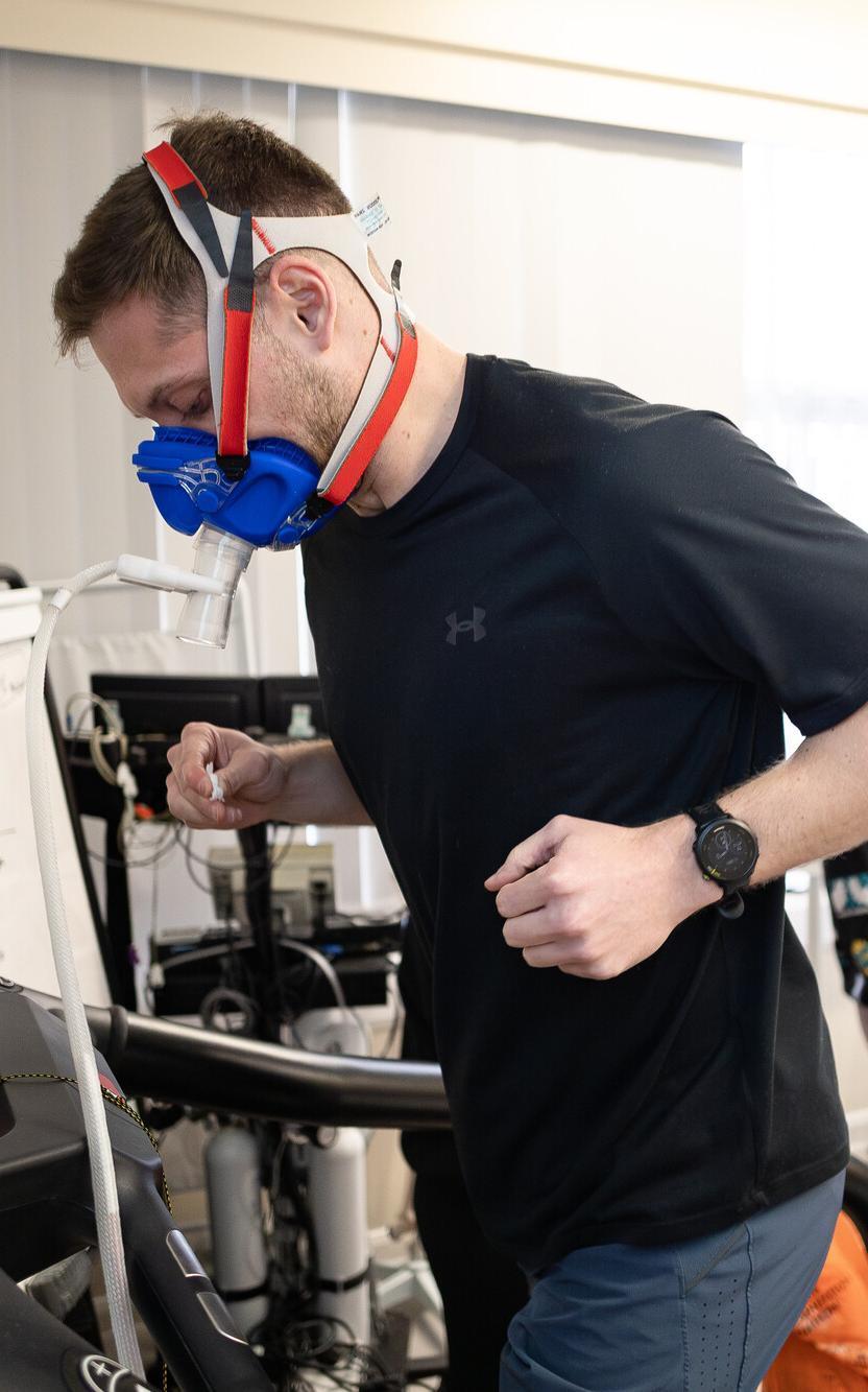 Exercise and Nutrition Science MSc student completing a treadmill fitness assessment in a sports science laboratory, using physiological testing equipment to analyse exercise performance and health outcomes.
