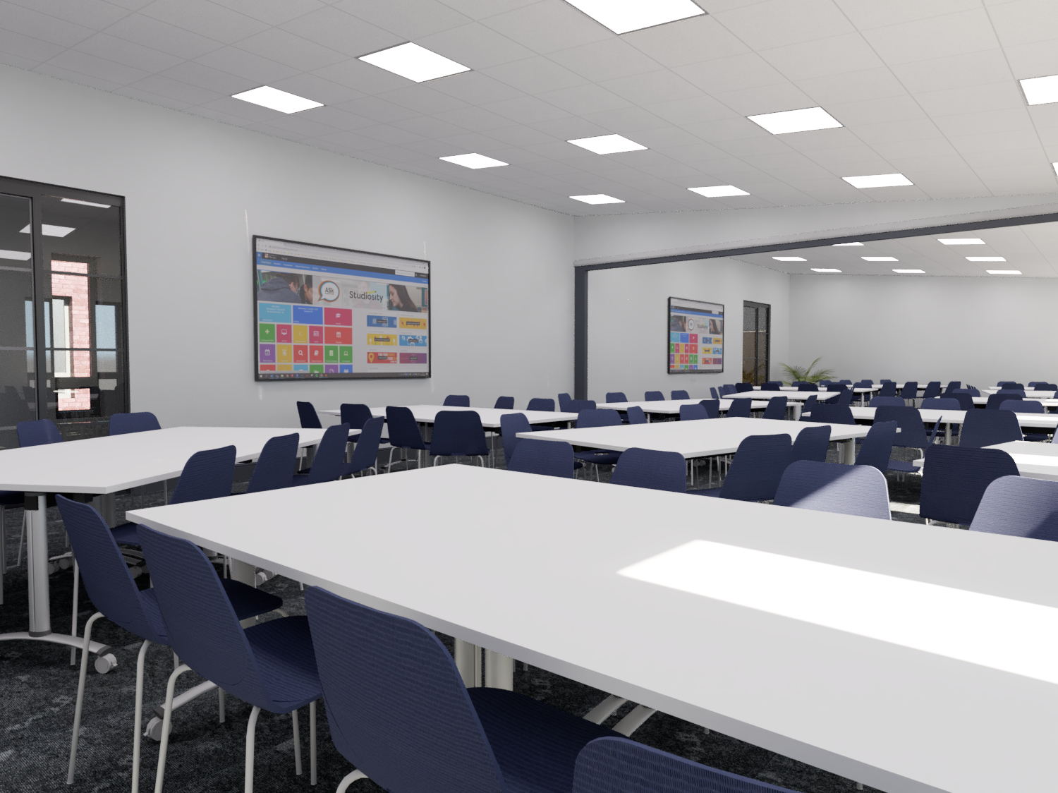 Modern classroom with white tables and blue chairs arranged for group learning
