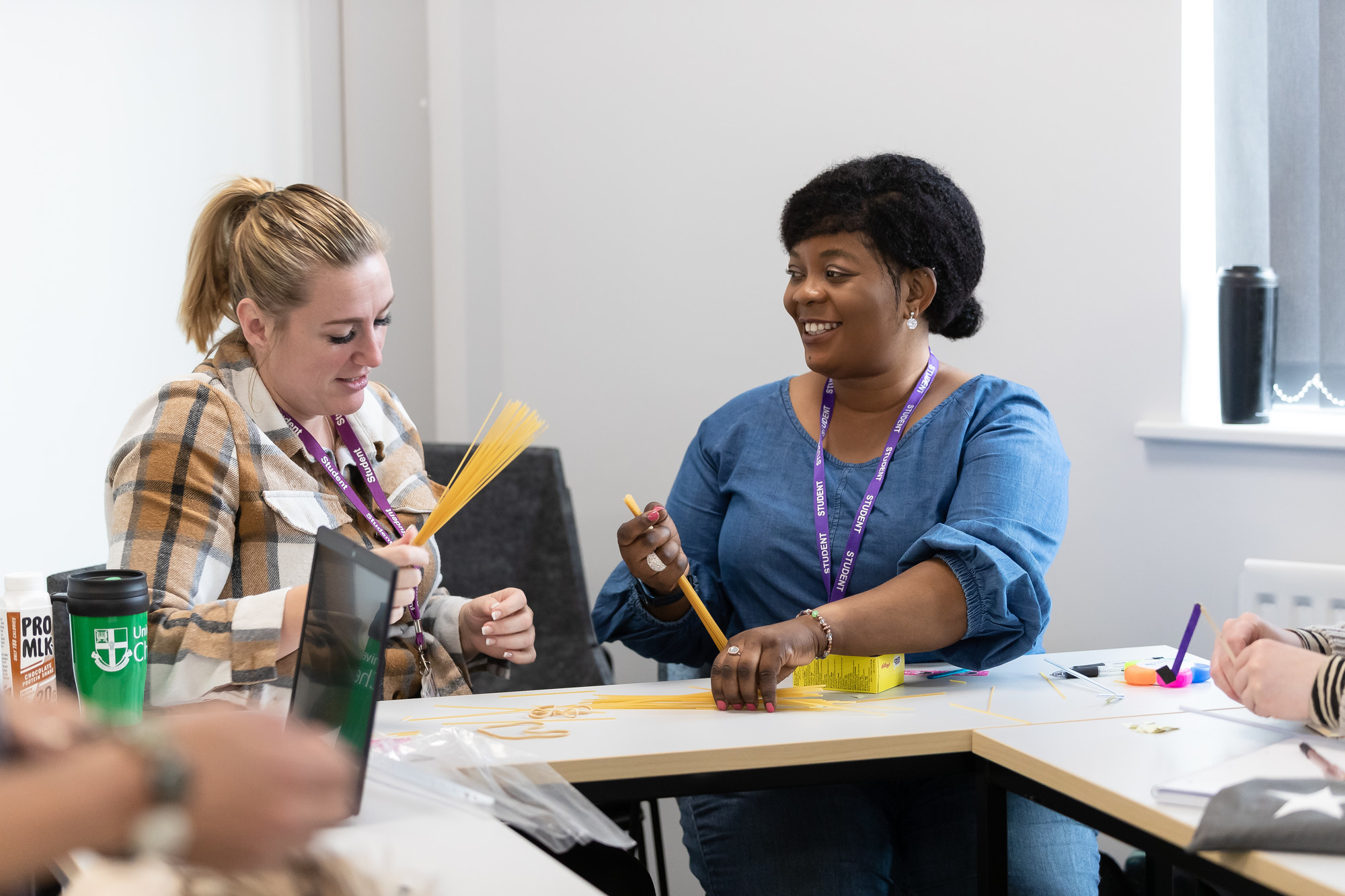 Two Social Work students working together